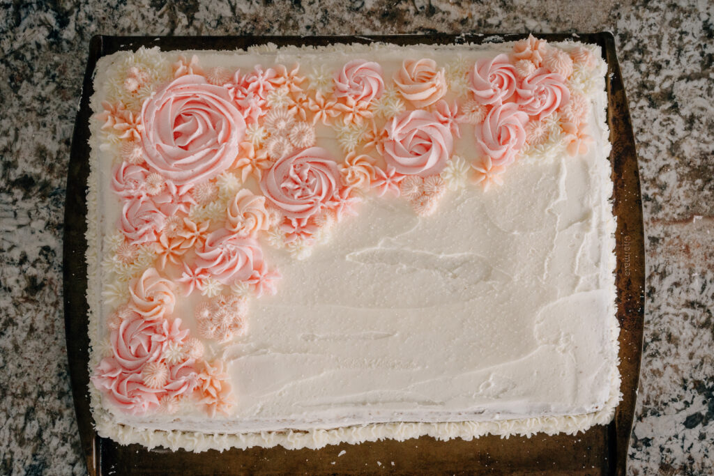 Overhead view of cake iced with buttercream icing.