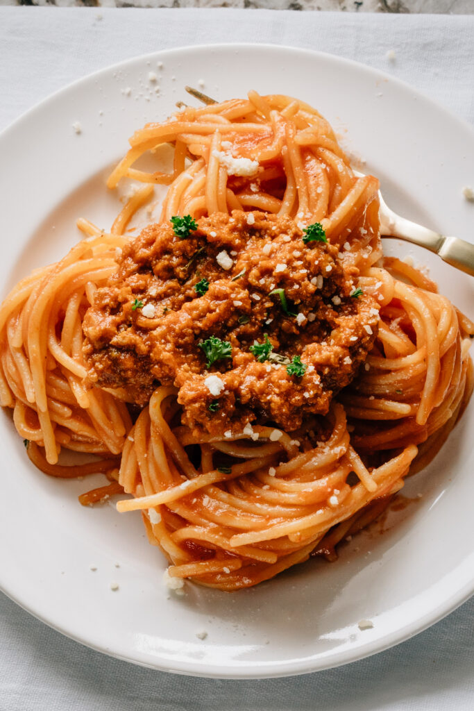Traditional spaghetti with meat sauce plated.