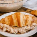 Light and delicious tuna salad in a fresh bakery croissant plated.