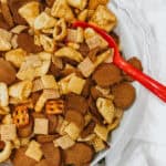 Caramel bugles, rye chips and chex all mixed together in a bowl. This an addicting sweet and salty snack mix!