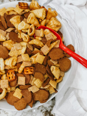 Caramel bugles, rye chips and chex all mixed together in a bowl. This an addicting sweet and salty snack mix!