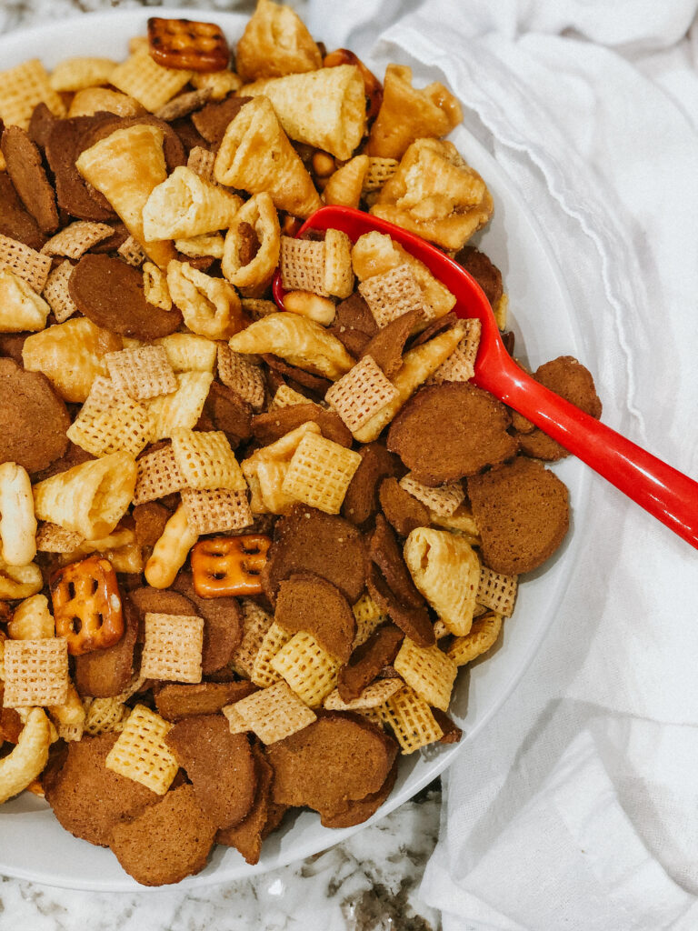 Caramel bugles, rye chips and chex all mixed together in a bowl. This an addicting sweet and salty snack mix!