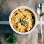 A cup full of the best creamy broccoli cheese rice casserole you ever tasted!