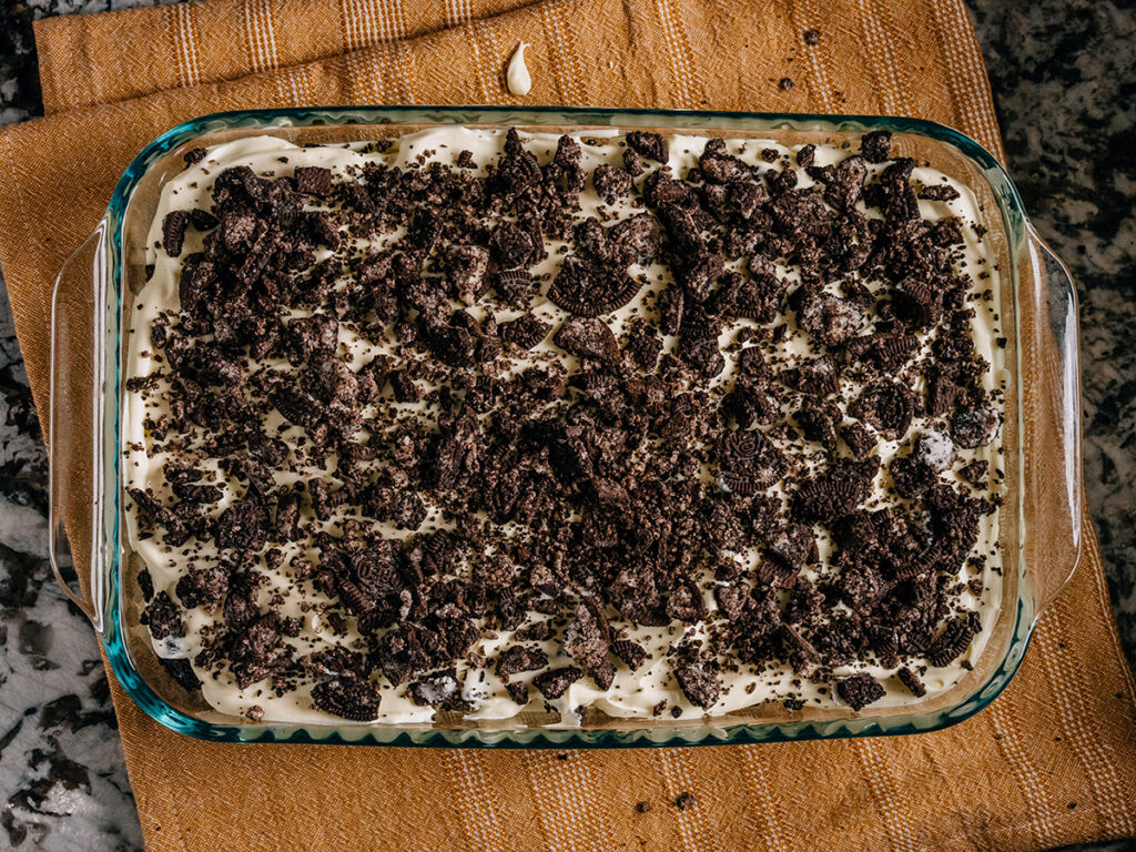Step 3: Add another layer of Oreo, the final layer of cream cheese mixture, and top with remaining Oreos. Chill.