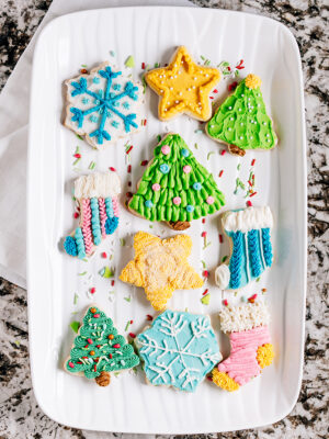 A variety platter of sugar cookies with a hint of lemon all decorated for Christmas and ready for a holiday party!