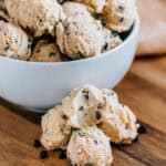 A bite taken out of chocolate chip cookie dough balls. The perfect simple snack!