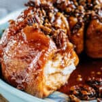 A delicious piece of flaky fresh bread topped with a brown sugar and butterscotch pudding glaze with caramelized pecans makes this subtle but sweet coffee cake!