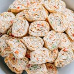Overview shot of veggie roll ups plated as the perfect party appetizer.
