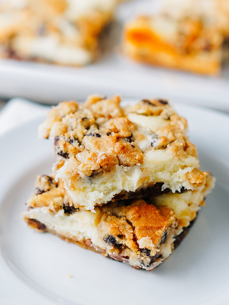 With a creamy cheesecake filling and delicious chocolate chip cookie on top and bottom, these dessert bars are scrumptious!