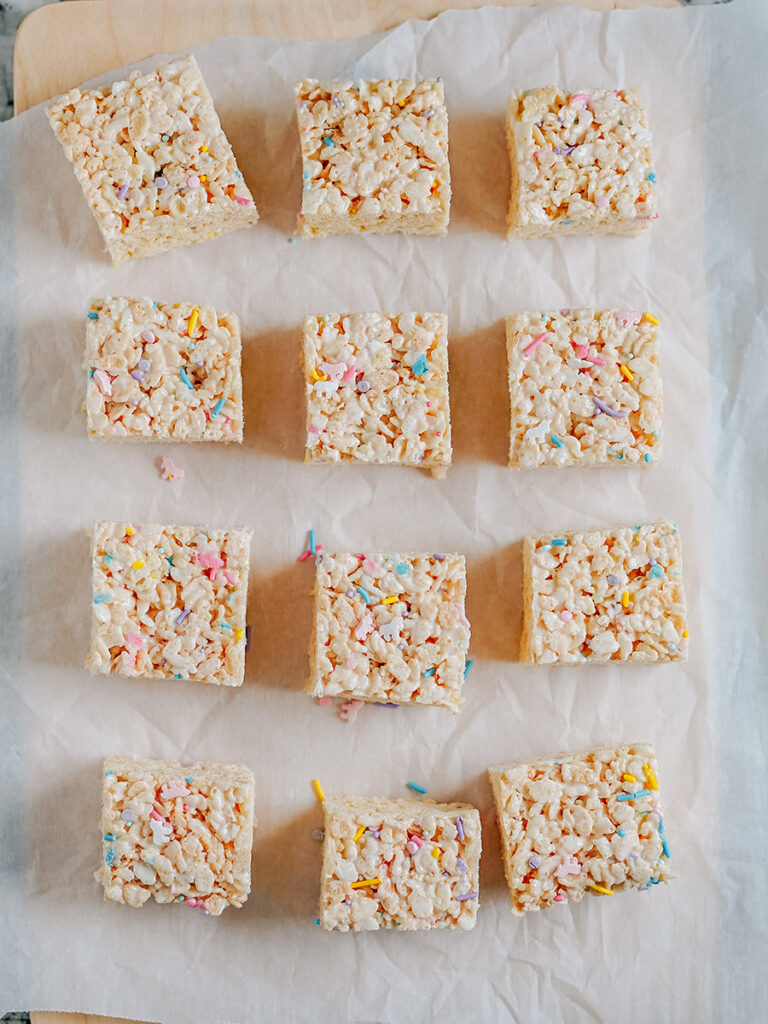 Over head shot of Rice Krispies Treats with unicorn sprinkles in them.