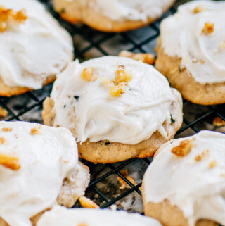 A completely wonderful cookie: Frosted zucchini cookies topped with a sprinkling of chopped walnuts.