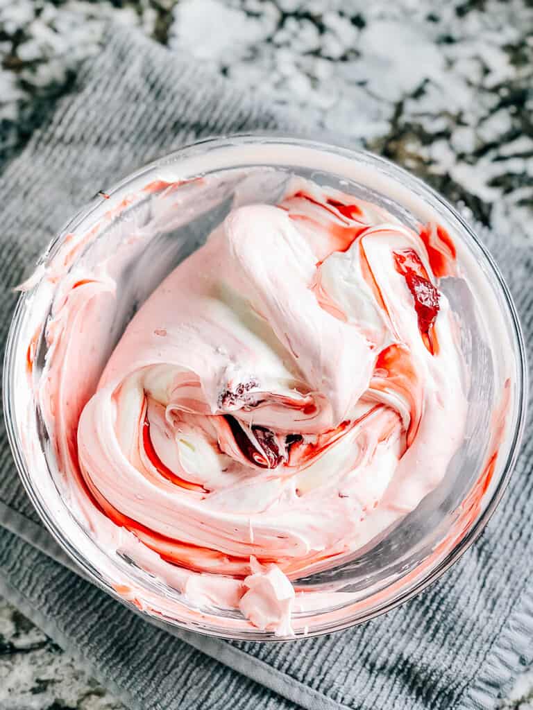 Gently swirled in strawberry pie filling to the cream cheese and cool whip base.