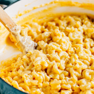 Creamy cheese sauce and perfectly cooked elbow macaroni make up this amazing homemade mac and cheese recipe.