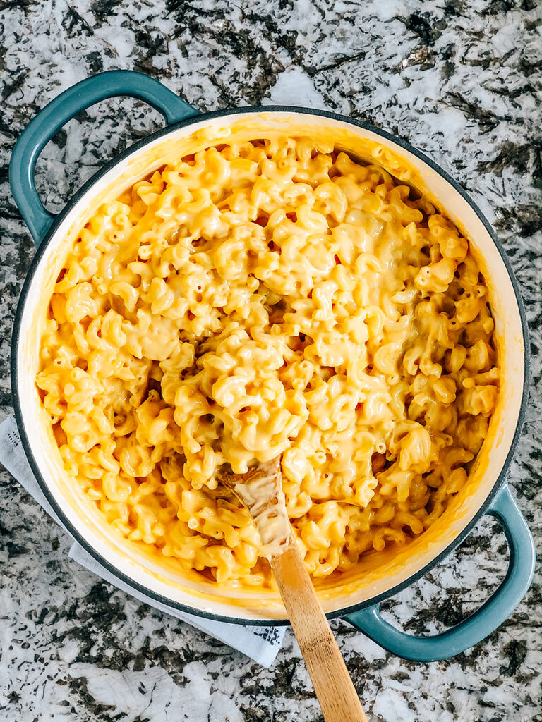 A hot pan of silky smooth and creamy homemade mac and cheese.