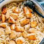 Tender seasoned chicken and fettuccine noodles covered in a thick homemade alfredo sauce make this the best creamy chicken alfredo!