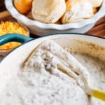 Homemade easy sausage gravy with fresly baked biscuits for a hearty family breakfast!