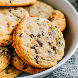 Close up of a single chocolate chip cookie.