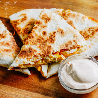Cooked and browned sliced easy chicken quesadilla!