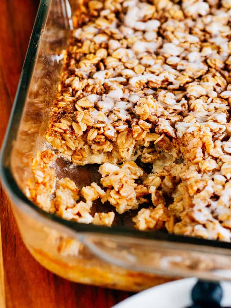 A serving taken out of the pan of freshly bake oatmeal.