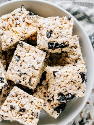 Oreo Rice Krispies stacked in a round serving dish ready to savored!
