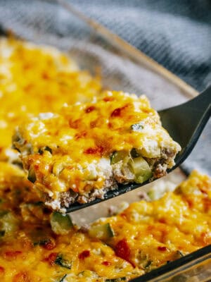 A piece of this sausage zucchini bake ready to be served!