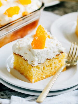 A delicious slice of Pig Pickin cake on a white plate.