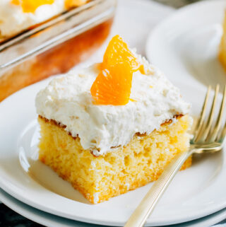 A delicious slice of Pig Pickin cake on a white plate.