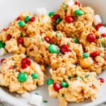 A close up of a plate of holiday cookies.