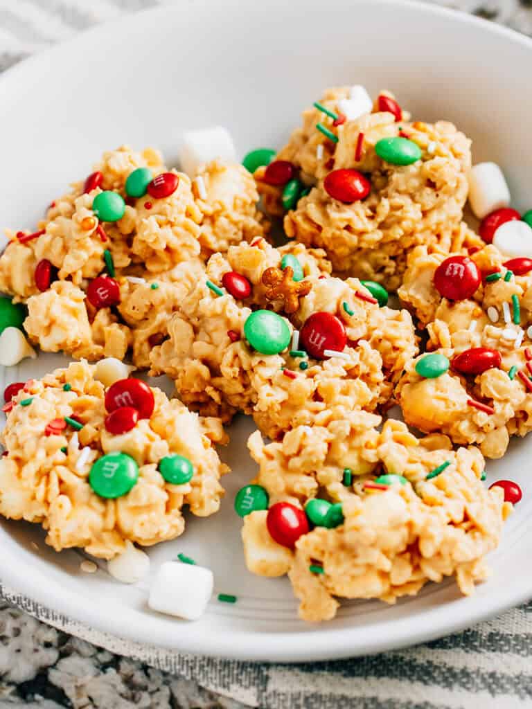 A close up of a plate of holiday cookies.