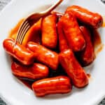 A plate of BBQ little smokies ready to served.