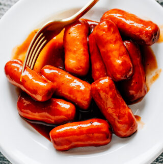 A plate of BBQ little smokies ready to served.