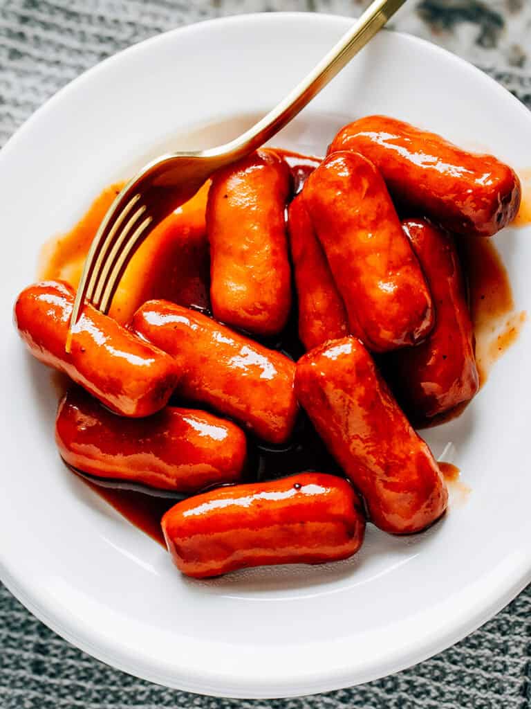 A plate of BBQ little smokies ready to served.
