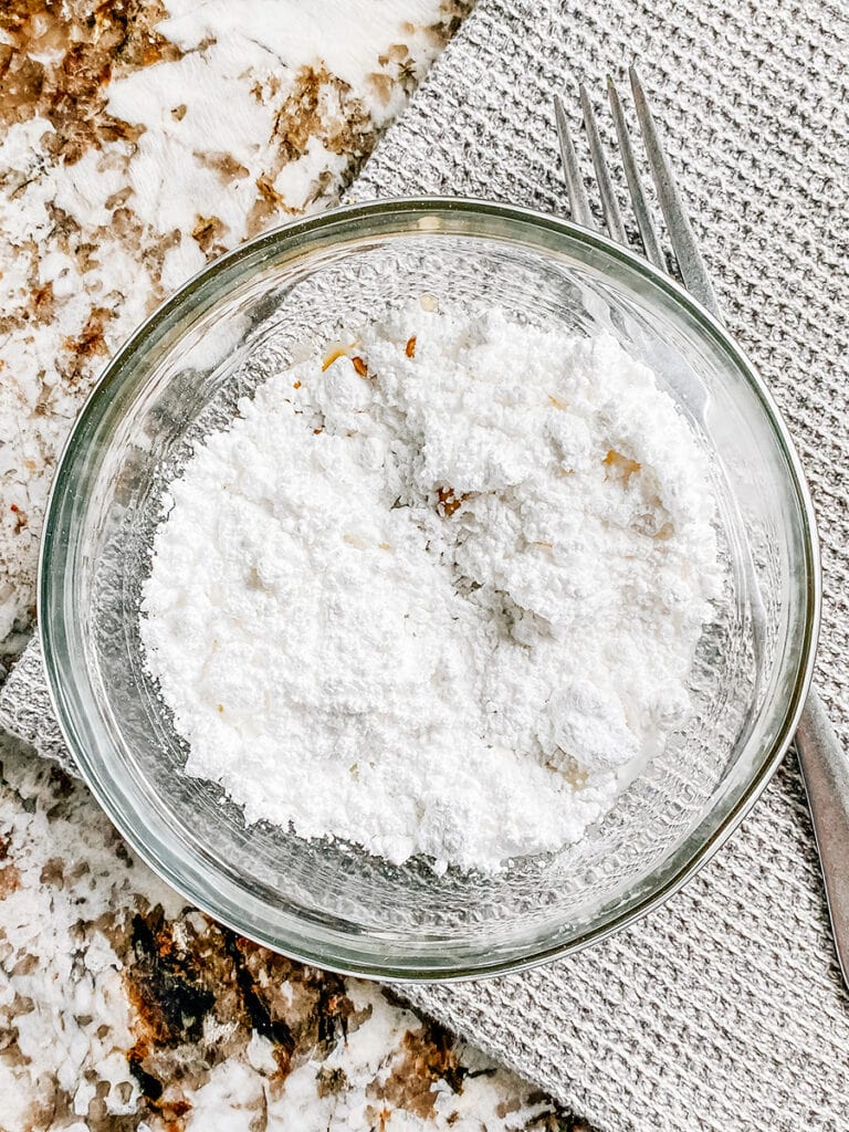 Powdered sugar, vanilla extract, and milk in a small mixing bowl to make the glaze.