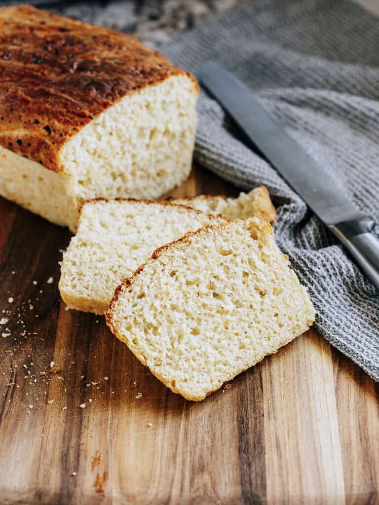 Sliced cottage cheese bread showing the fluffy inside of the bread loaf.