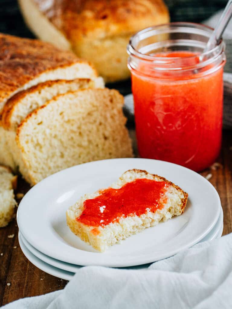 Cottage cheese bread with our easy homemade strawberry freezer jam on it.