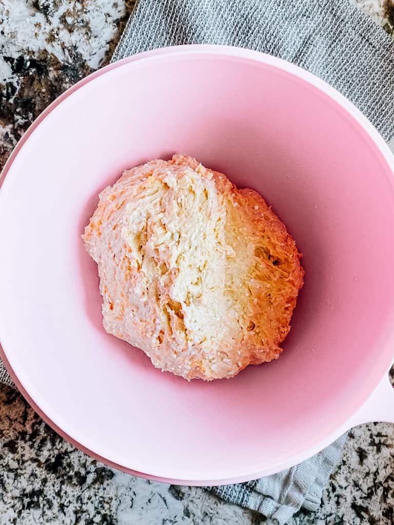 The completely combine cottage cheese bread dough.