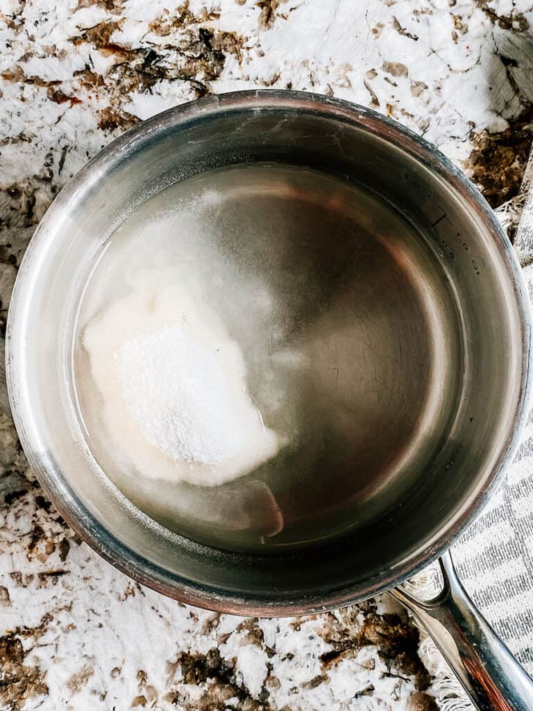 Sure-Jell Pectin and water in a small saucepan.