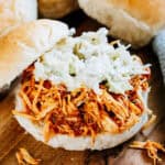 A hot honey chicken sandwich with pickle slaw and a homemade bun is the perfect combination of heat and sweet.