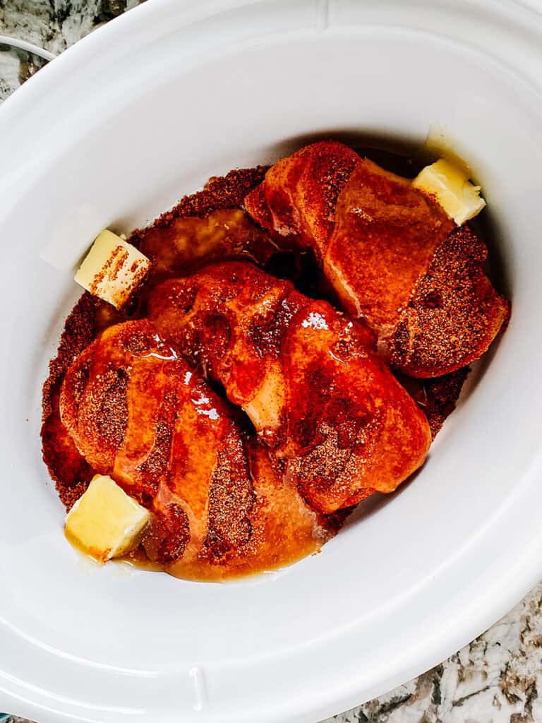 Vinegar added to the slow cooker.