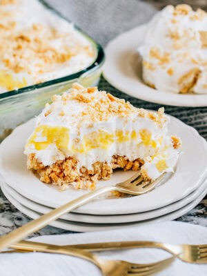 Oreo Lemon Dirt Dessert showing off its creamy, light, buttery, zesty layers. The perfect cool summer dessert.