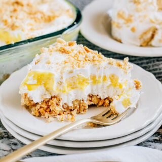 Oreo Lemon Dirt Dessert showing off its creamy, light, buttery, zesty layers. The perfect cool summer dessert.