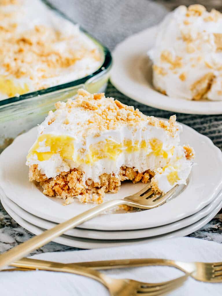 Oreo Lemon Dirt Dessert showing off its creamy, light, buttery, zesty layers. The perfect cool summer dessert.