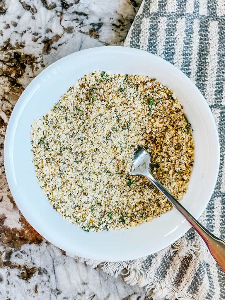 The whisked Italian garlic seasoning for homemade breadsticks.