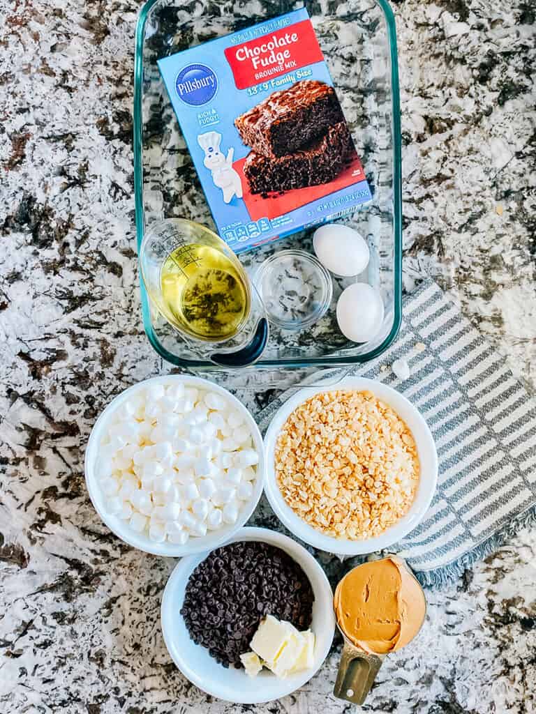 The ingredients to Peanut Butter Chocolate Rice Krispies Marshmallow Brownies.