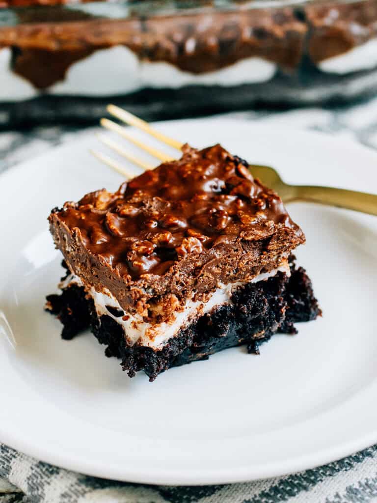 The BEST peanut butter Krispie marshmallow brownies full of the perfect ration of chocolate fudge brownie, chewy marshmallow, and yummy crispy rice goodness.