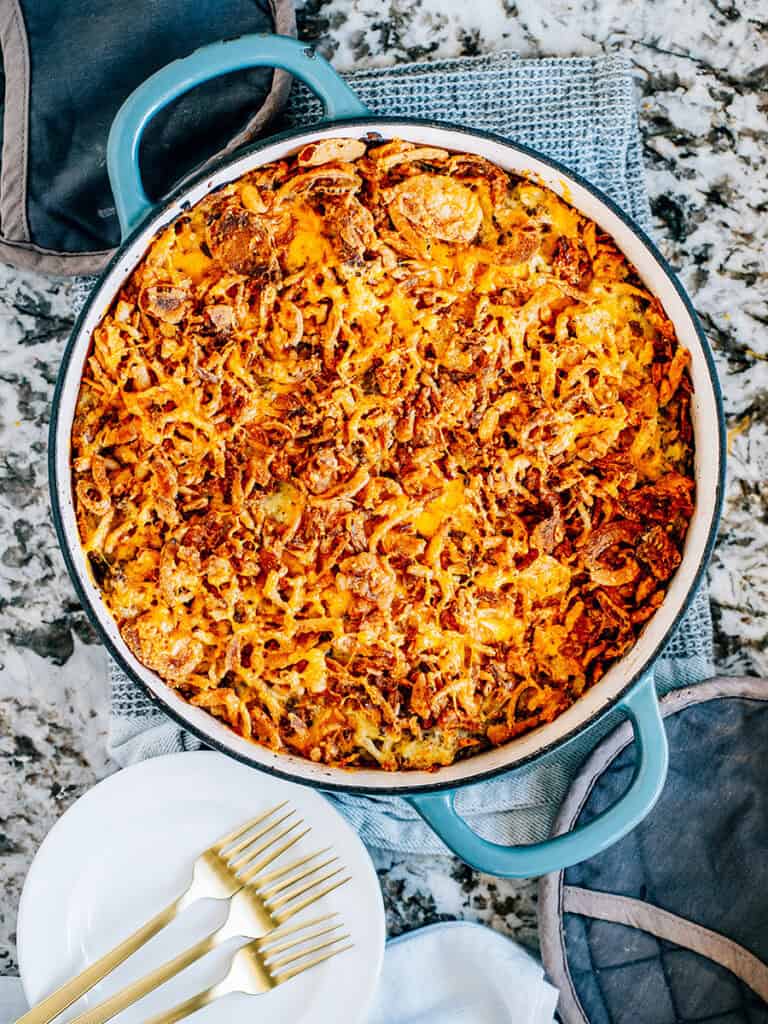 Baked golden brown with soft hash browns and browned ground beef in a creamy sauce topped with crispy Frenchs fried onions and cheese is this easy casserole ready to eat!