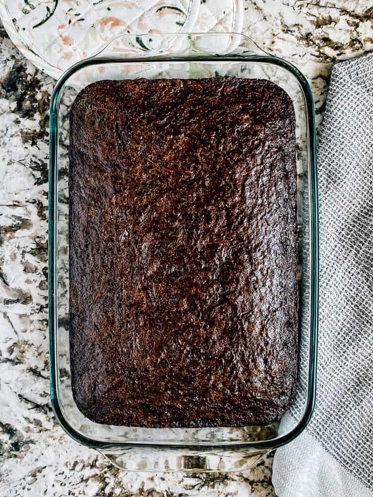 A 9x13-inch pan of freshly baked zucchini brownies.