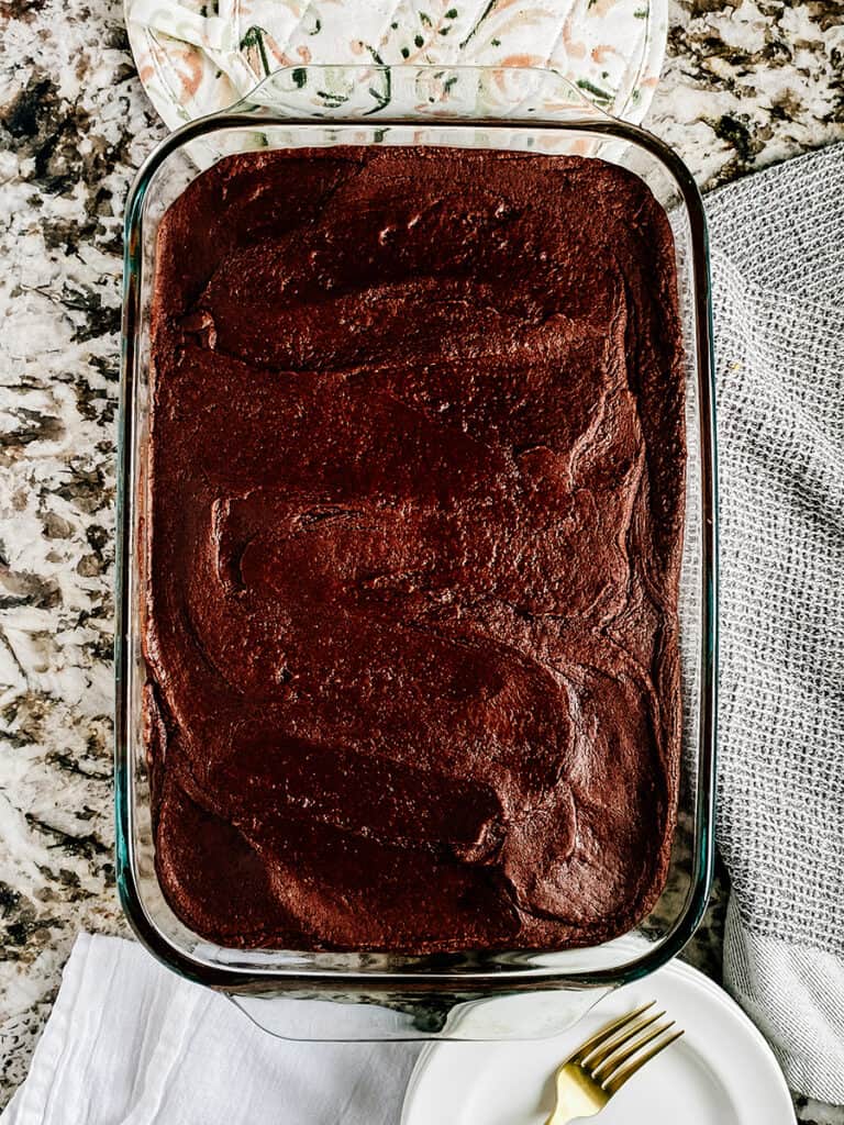 The cooled zucchini brownies with a one-minute frosting.