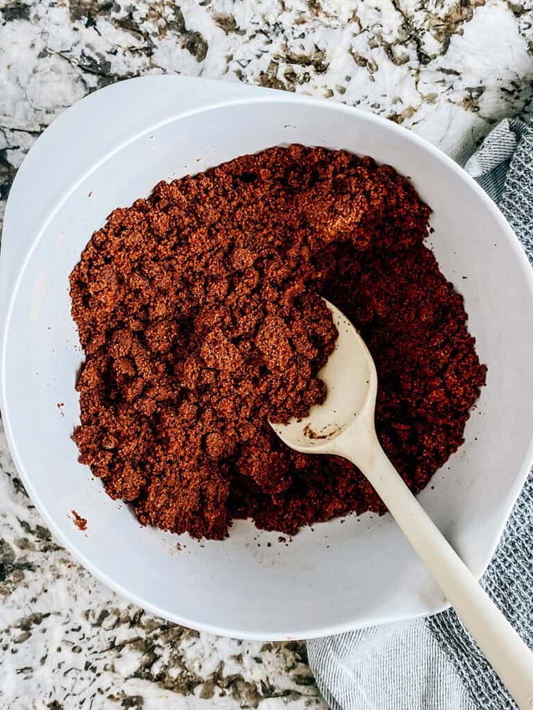 Mixed wet and dry ingredients that formed a loose crumble.
